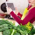 Woman having green vegetables thinking about cooking Royalty Free Stock Photo