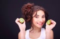 Young woman with kiwi