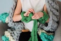 Young woman kniting merino wool with hands Royalty Free Stock Photo