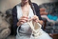 Young woman knits