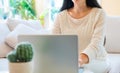 Young woman with a laptop computer