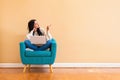 Young woman with a laptop computer pointing something Royalty Free Stock Photo