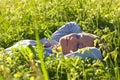 Young woman laying on field