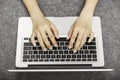 Young woman laying while using laptop Royalty Free Stock Photo