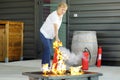 young woman learning to use fire extinguisher Royalty Free Stock Photo