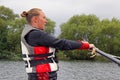 Young woman learning to water ski Royalty Free Stock Photo