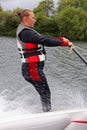 Young woman learning to water ski Royalty Free Stock Photo