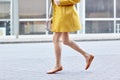 Young woman legs running along on city street Royalty Free Stock Photo