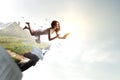 Young woman levitates while reading a book Royalty Free Stock Photo