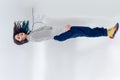 Young woman levitating on white Royalty Free Stock Photo