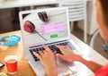 Young woman in the library with laptop and coffe. Login screen Royalty Free Stock Photo