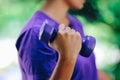 young woman lifting dumbbell weight Royalty Free Stock Photo