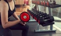 Young woman lifting weights on training class at gym. Concept fitness ,workout, gym exercise ,lifestyle and healthy Royalty Free Stock Photo