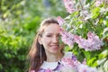 A young woman in lilac flowers Royalty Free Stock Photo