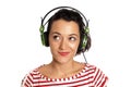 Young woman listening music headphones isolated Royalty Free Stock Photo