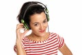 Young woman listening music headphones isolated Royalty Free Stock Photo