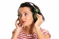 Young woman listening music headphones isolated Royalty Free Stock Photo