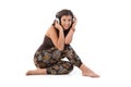Young woman listening music smiling Royalty Free Stock Photo
