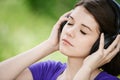 Young woman listening to music