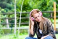Young woman listening to music on headphones Royalty Free Stock Photo