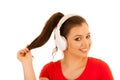 young woman listens music with headset isolated over white background Royalty Free Stock Photo