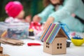 Young woman and little boy with autistic disorder playing