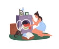 Young woman loading washing machine. Girl puts dirty clothes from basket in open door of laundry drum. Housewife does Royalty Free Stock Photo