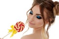 Young woman with lollipop. Royalty Free Stock Photo