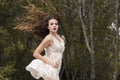 Young woman wear handmade look dress in forest Royalty Free Stock Photo