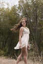 Young woman wear handmade look dress in forest Royalty Free Stock Photo