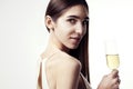 Young woman with long hair celebrating with champagne. Party, New Year, Christmas concept