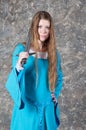 Young woman with long hair poses with sword Royalty Free Stock Photo