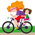 A young woman with long red hair rides a bicycle, behind her sits a little girl