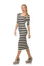 Young woman in long striped dress isolated on