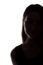 Young woman look ahead with flowing hair - vertical silhouette Royalty Free Stock Photo