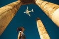 Young woman look at airplane dreaming about vacation. Explore the world. Export concept. Time to travel. Freedom life. Independent Royalty Free Stock Photo