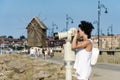 Young Woman Looking at the Amazing View Through a Coin Binocular in a Observation point in Bulgaria