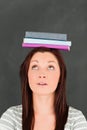 Young woman looking at the books Royalty Free Stock Photo