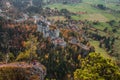 Young woman looking at the famous royal castles of Neuschwanstein and Hohenschwangau in the autumn season. Vacation in mountains. Royalty Free Stock Photo