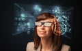 Young woman looking with futuristic smart high tech glasses Royalty Free Stock Photo
