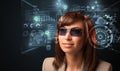 Young woman looking with futuristic smart high tech glasses Royalty Free Stock Photo