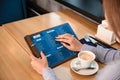 Young woman looking through menu in restaurant Royalty Free Stock Photo