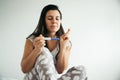 Young woman looking at pregnance test in happiness