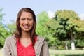 Young woman looking straight ahead with a smile on her face Royalty Free Stock Photo