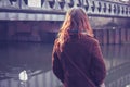 Young woman looking at a swan Royalty Free Stock Photo