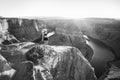 Young woman looking to Horseshoe Bend and Colorado river. Famous hiking place. Glen Canyon, Arizona, USA. Travel and Royalty Free Stock Photo