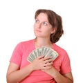 The young woman looks thoughtfully with the money in her hands, isol Royalty Free Stock Photo