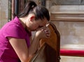 Young woman lost in pray