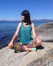 Young woman in lotus pose