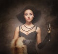 A young woman in luxurious clothes with champagne Royalty Free Stock Photo